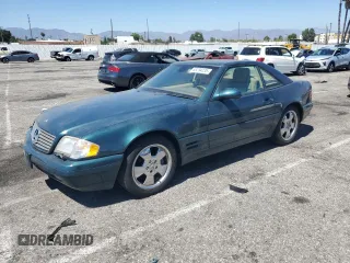 1999 Mercedes-Benz SL 500 with VIN WDBFA68F3XF184181, listed as a Copart auction lot 63794235 with 186,700 mi miles and Clean title. Bid and sale history available at DreamBid. Image 1.