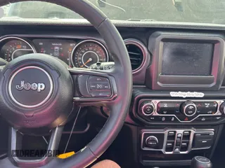 2023 Jeep Wrangler Sport S with VIN 1C4HJXDG2PW615754, listed as a Copart auction lot 53884255 with 34,427 mi miles and Clean Title. Bid and sale history available at DreamBid. Image 9.
