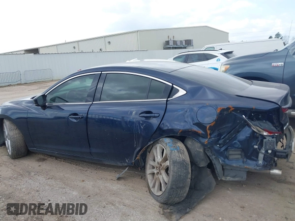 2017 Mazda Mazda6 Touring with VIN JM1GL1V54H1107722, listed as a IAAI auction lot 41521257 with 142,129 mi miles. Bid and sale history available at carsss.com. Image 15.