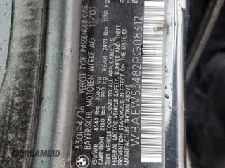2002 BMW 3 Series 330xi with VIN WBAEW53482PG08312, listed as a Copart auction lot 80872734 with 180,306 mi miles and Salvage title. Bid and sale history available at DreamBid. Image 11.