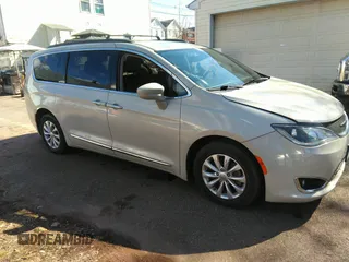 2017 Chrysler Pacifica Touring L with VIN 2C4RC1BG8HR785447, listed as a IAAI auction lot 41758441 with 57,202 mi miles and . Bid and sale history available at DreamBid. Image 1.