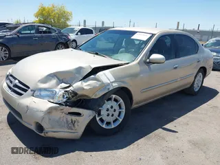 2000 Nissan Maxima GXE z VIN JN1CA31D0YT739248, wystawiony jako IAAI lot #42089086 z przebiegiem 140 979 mil mil oraz . Historia ofert i sprzedaży dostępna na DreamBid. Obrazek 17.