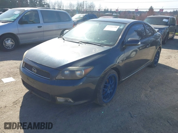 2006 Scion tC with VIN JTKDE177860107651, listed as a IAAI auction lot 41753758 with 212,401 mi miles. Bid and sale history available at carsss.com. Image 2.