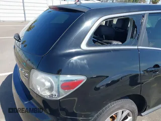 2011 Mazda CX-7 s Touring with VIN JM3ER4C32B0356372, listed as a IAAI auction lot 42003608 with 127,071 mi miles. Bid and sale history available at carsss.com. Image 6.
