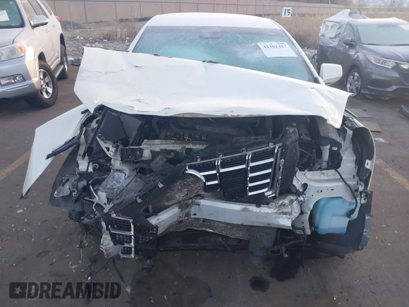 2014 Cadillac XTS Premium with VIN 2G61P5S30E9123057, listed as a IAAI auction lot 41301457 with 123,042 mi miles and . Bid and sale history available at DreamBid. Image 12.