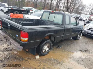 1996 Ford Ranger XLT with VIN 1FTCR14X2TPA32945, listed as a IAAI auction lot 41771203 with 113,474 mi miles. Bid and sale history available at carsss.com. Image 4.