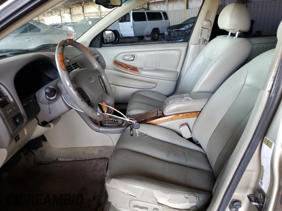 2004 Infiniti I35 z VIN JNKDA31A84T212784, wystawiony jako Copart lot #57489145 z przebiegiem 152 439 mil mil oraz Szkoda całkowita • Salvage title. Historia ofert i sprzedaży dostępna na DreamBid. Obrazek 7.