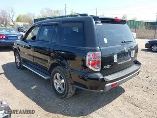 2007 Honda Pilot EX-L with VIN 2HKYF18537H502361, listed as a IAAI auction lot 42039836 with 167,431 mi miles. Bid and sale history available at carsss.com. Image 3.