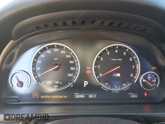 2014 BMW M5 z VIN WBSFV9C55ED593760, wystawiony jako Copart lot #49070765 z przebiegiem 128 365 mil mil oraz Tytuł czysty. Historia ofert i sprzedaży dostępna na DreamBid. Obrazek 9.