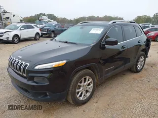 2014 Jeep Cherokee Latitude with VIN 1C4PJLCB4EW175236, listed as a IAAI auction lot 40788919 with 174,324 mi miles and . Bid and sale history available at DreamBid. Image 17.