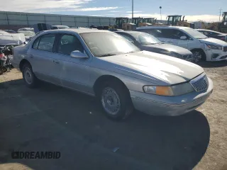 1996 Lincoln Continental z VIN 1LNLM97V3TY627803, wystawiony jako Copart lot #87036654 z przebiegiem 118 078 mil mil oraz Szkoda całkowita • Salvage title. Historia ofert i sprzedaży dostępna na DreamBid. Obrazek 4.