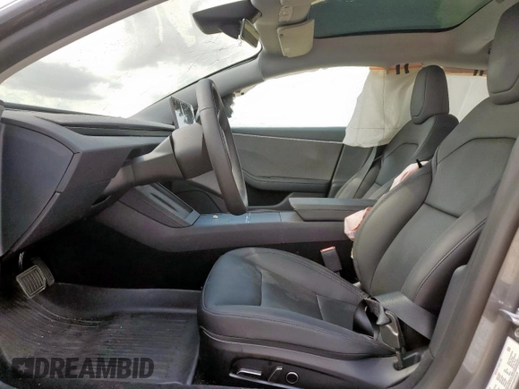 2025 Tesla Model 3 Long Range z VIN 5YJ3E1EA0SF878134, wystawiony jako Copart lot #59854975 z przebiegiem Nie podano mil oraz Szkoda całkowita • Salvage title. Historia ofert i sprzedaży dostępna na DreamBid. Obrazek 7.