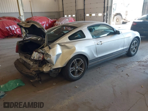 2011 Ford Mustang V6 with VIN 1ZVBP8AM9B5106521, listed as a IAAI auction lot 42041970 with 220,108 mi miles and . Bid and sale history available at DreamBid. Image 4.