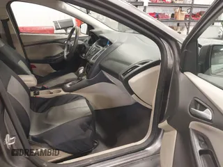 2013 Ford Focus SE with VIN 1FADP3F26DL359581, listed as a IAAI auction lot 42129909 with 129,832 mi miles. Bid and sale history available at carsss.com. Image 5.