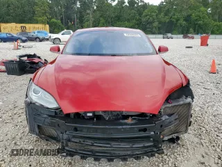2014 Tesla Model S 60 with VIN 5YJSA1H11EFP43669, listed as a Copart auction lot 62368605 with Not provided miles and Salvage title. Bid and sale history available at DreamBid. Image 5.