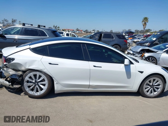 2022 Tesla Model 3 with VIN 5YJ3E1EA3NF294282, listed as a IAAI auction lot 41992046 with 22,383 mi miles. Bid and sale history available at carsss.com. Image 13.
