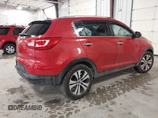 2011 Kia Sportage EX with VIN KNDPC3A29B7013959, listed as a IAAI auction lot 42196494 with 103,850 mi miles and . Bid and sale history available at carsss.com. Image 4.