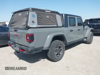 2022 Jeep Gladiator Rubicon z VIN 1C6JJTBG2NL167034, wystawiony jako IAAI lot #41854225 z przebiegiem Nie podano mil oraz . Historia ofert i sprzedaży dostępna na DreamBid. Obrazek 4.