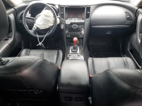 2015 Infiniti QX70 with VIN JN8CS1MW0FM482227, listed as a Copart auction lot 56796535 with 139,531 mi miles and Salvage title. Bid and sale history available at DreamBid. Image 8.
