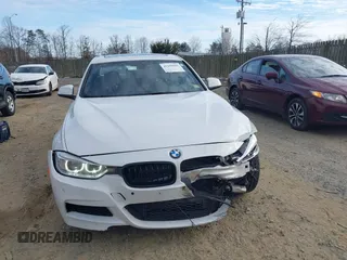 2013 BMW 3 Series 335i xDrive with VIN WBA3B9G59DNR90147, listed as a IAAI auction lot 41449582 with 109,526 mi miles and . Bid and sale history available at DreamBid. Image 12.
