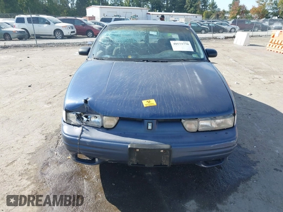 1997 Oldsmobile Cutlass Supreme S z VIN 1G3WH52M3VF338576, wystawiony jako IAAI lot #40573770 z przebiegiem 105 806 mil mil oraz . Historia ofert i sprzedaży dostępna na DreamBid. Obrazek 12.