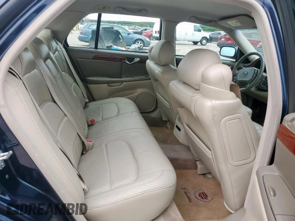 2005 Cadillac DeVille z VIN 1G6KD54Y75U129768, wystawiony jako Copart lot #55890325 z przebiegiem 97 463 mil mil oraz Czysty tytuł • Clean title. Historia ofert i sprzedaży dostępna na DreamBid. Obrazek 10.