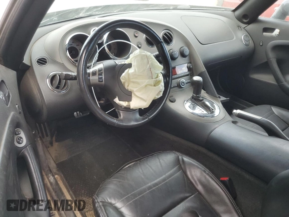 2009 Pontiac Solstice z VIN 1G2MN35B69Y105093, wystawiony jako Copart lot #72854034 z przebiegiem 82 333 mil mil oraz Szkoda całkowita • Salvage title. Historia ofert i sprzedaży dostępna na DreamBid. Obrazek 8.