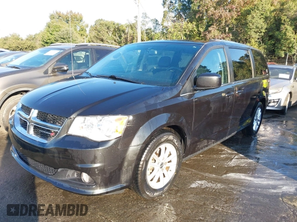 2018 Dodge Grand Caravan SXT with VIN 2C4RDGCG2JR266074, listed as a IAAI auction lot 40545630 with 98,036 mi miles and . Bid and sale history available at DreamBid. Image 2.