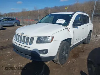 2014 Jeep Compass Latitude with VIN 1C4NJDEB8ED622012, listed as a IAAI auction lot 41917126 with 143,065 mi miles. Bid and sale history available at carsss.com. Image 2.