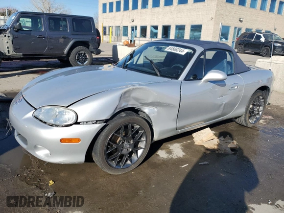 2004 Mazda MX-5 Miata LS with VIN JM1NB353640402308, listed as a Copart auction lot 84568244 with 50,287 mi miles and Salvage title. Bid and sale history available at DreamBid. Image 1.