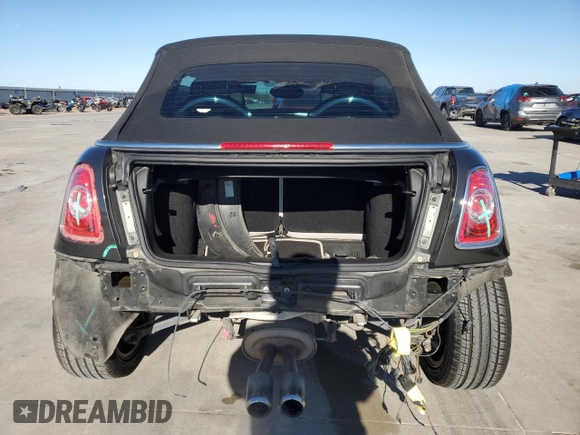 2014 MINI Convertible S with VIN WMWZP3C58ET706941, listed as a Copart auction lot 81900674 with 61,292 mi miles and Salvage title. Bid and sale history available at DreamBid. Image 6.