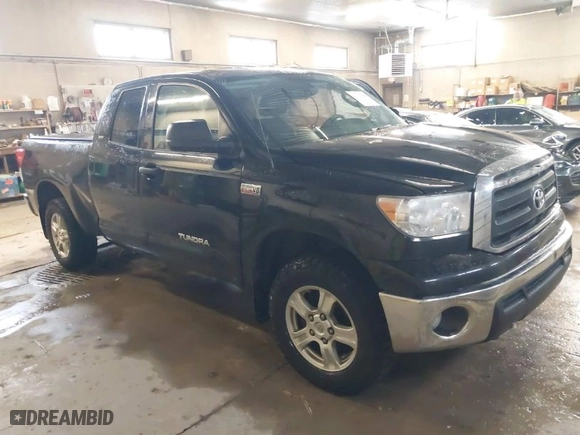 2013 Toyota Tundra 4WD Truck with VIN 5TFUW5F16DX305142, listed as a IAAI auction lot 41139364 with 212,390 mi miles. Bid and sale history available at carsss.com. Image 1.