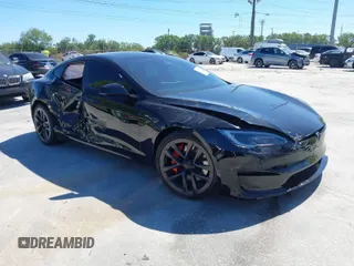 2023 Tesla Model S Plaid with VIN 5YJSA1E67PF528171, listed as a IAAI auction lot 41831086 with Not provided miles and . Bid and sale history available at DreamBid. Image 1.
