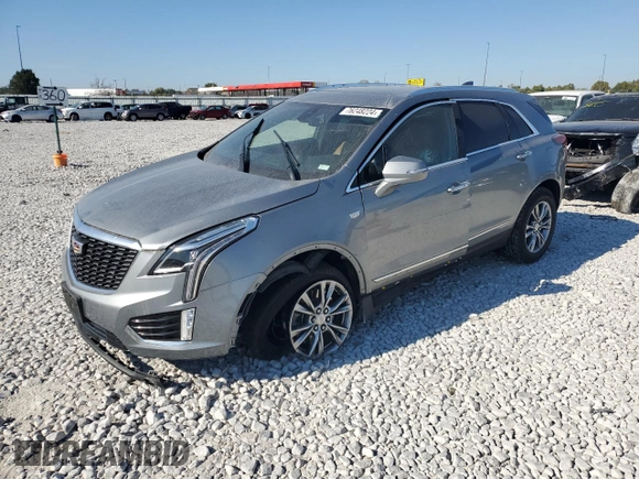 2023 Cadillac XT5 FWD Premium Luxury with VIN 1GYKNCRS6PZ100071, listed as a Copart auction lot 76248224 with 25,613 mi miles and Salvage Title. Bid and sale history available at carsss.com. Image 1.