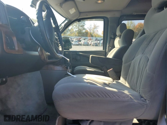 2005 Chevrolet Express Cargo Van YF7 Upfitter with VIN 1GBFG15T451209911, listed as a Copart auction lot 77113804 with 165,278 mi miles and Salvage Title. Bid and sale history available at carsss.com. Image 7.