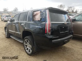 2015 Cadillac Escalade Luxury with VIN 1GYS4MKJ4FR665766, listed as a Copart auction lot 59316120 with 124,439 mi miles and Salvage Title. Bid and sale history available at carsss.com. Image 3.