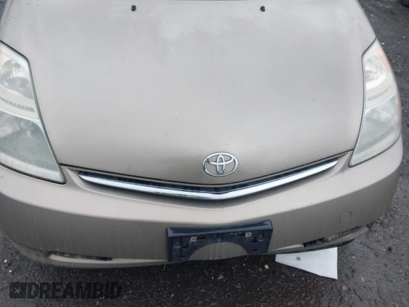 2006 Toyota Prius z VIN JTDKB20U067517414, wystawiony jako IAAI lot #42251158 z przebiegiem 233 266 mil mil oraz . Historia ofert i sprzedaży dostępna na DreamBid. Obrazek 6.