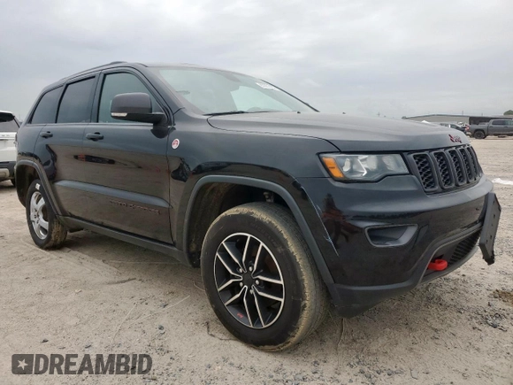 2019 Jeep Grand Cherokee Trailhawk with VIN 1C4RJFLG8KC613582, listed as a Copart auction lot 62901405 with 136,809 mi miles and Salvage title. Bid and sale history available at DreamBid. Image 4.
