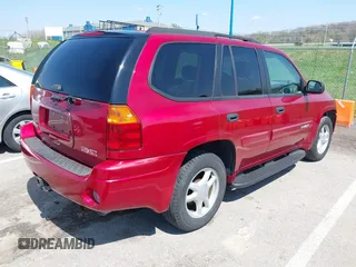 2005 GMC Envoy SLT with VIN 1GKDS13SX52144959, listed as a IAAI auction lot 41968495 with 238,199 mi miles. Bid and sale history available at carsss.com. Image 4.