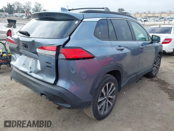 2022 Toyota Corolla Cross XLE with VIN 7MUDAABG6NV007009, listed as a IAAI auction lot 42409061 with 37,178 mi miles and . Bid and sale history available at DreamBid. Image 4.