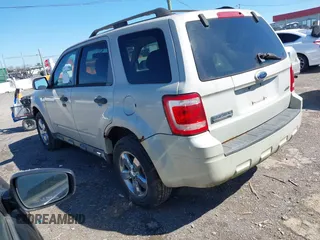 2008 Ford Escape XLT with VIN 1FMCU93198KC12899, listed as a IAAI auction lot 41768951 with 202,830 mi miles. Bid and sale history available at carsss.com. Image 3.