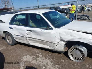 2002 Mercury Grand Marquis LS Premium z VIN 2MEFM75W92X641347, wystawiony jako IAAI lot #41701179 z przebiegiem 79 942 mil mil oraz . Historia ofert i sprzedaży dostępna na DreamBid. Obrazek 13.