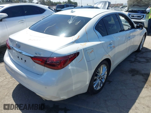 2024 Infiniti Q50 Luxe with VIN JN1EV7BP5RM601925, listed as a IAAI auction lot 42261752 with 1,511 mi miles and . Bid and sale history available at DreamBid. Image 4.