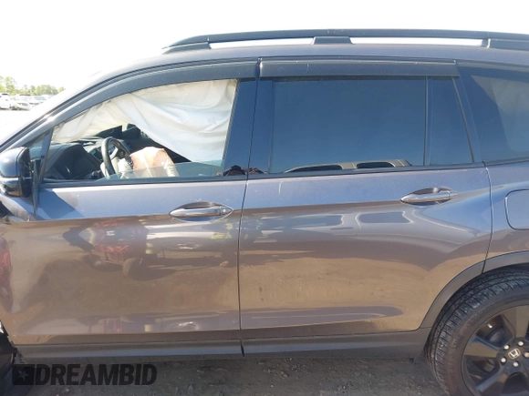 2019 Honda Passport Elite with VIN 5FNYF8H04KB004657, listed as a IAAI auction lot 41993974 with 90,964 mi miles and . Bid and sale history available at DreamBid. Image 14.