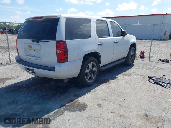 2009 Chevrolet Tahoe Police with VIN 1GNEC03099R267694, listed as a IAAI auction lot 41625587 with 141,918 mi miles and . Bid and sale history available at DreamBid. Image 4.