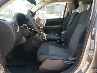 2016 Jeep Compass Sport z VIN 1C4NJDBB8GD631624, wystawiony jako Copart lot #61250695 z przebiegiem 124 133 mil mil oraz Szkoda całkowita • Salvage title. Historia ofert i sprzedaży dostępna na DreamBid. Obrazek 7.