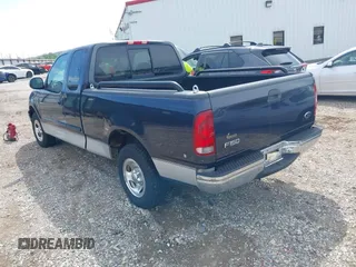 2000 Ford F-150 XL with VIN 1FTRX17W1YKA06683, listed as a IAAI auction lot 42118268 with 1 mi miles. Bid and sale history available at carsss.com. Image 3.
