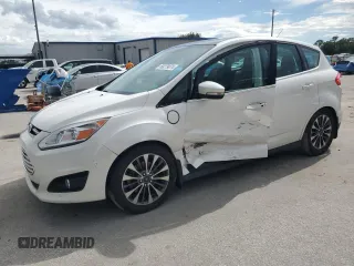 2017 Ford C-Max Energi Titanium with VIN 1FADP5FU9HL100117, listed as a Copart auction lot 69279074 with 153,601 mi miles and Salvage Title. Bid and sale history available at carsss.com. Image 1.