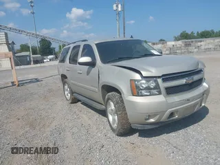 2008 Chevrolet Tahoe 2LT with VIN 1GNFC13098R137505, listed as a IAAI auction lot 40189564 with 184,954 mi miles and . Bid and sale history available at DreamBid. Image 1.