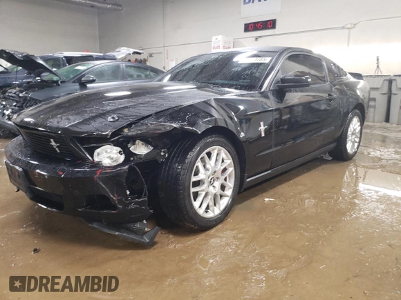 2012 Ford Mustang V6 Premium with VIN 1ZVBP8AM2C5221267, listed as a Copart auction lot 46583785 with 104,654 mi miles and Salvage Title. Bid and sale history available at carsss.com. Image 1.